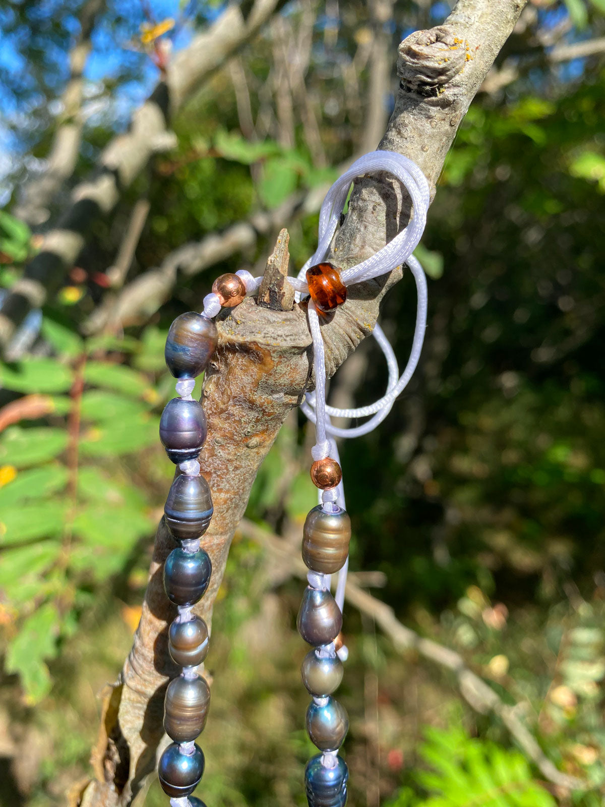 Blue pearl knot necklace