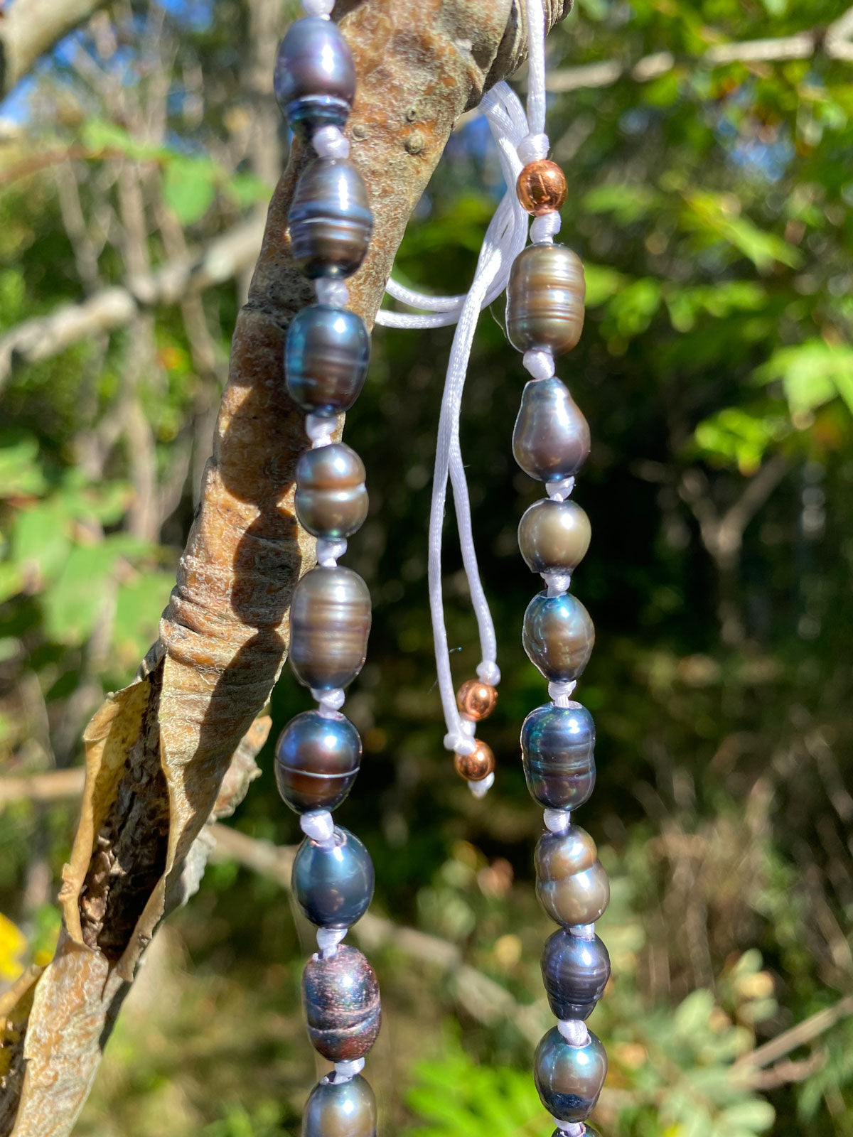 Blue pearl knot necklace