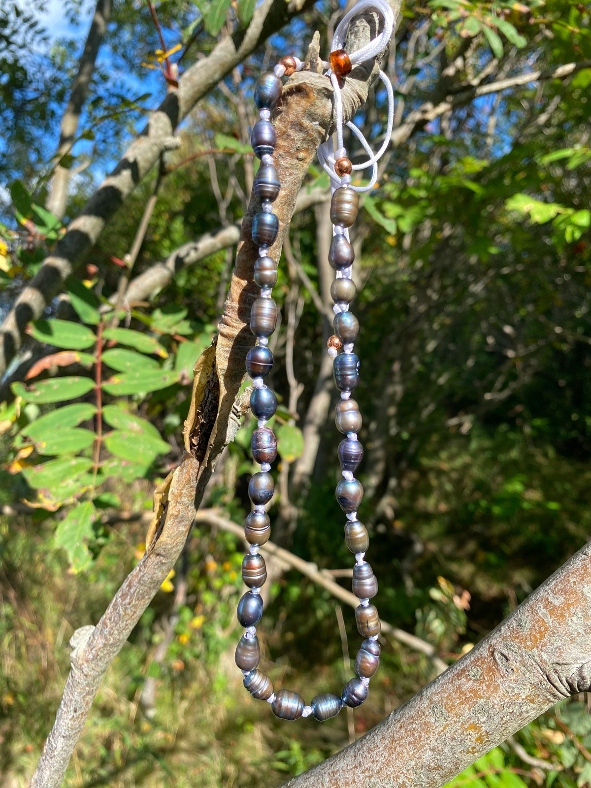 Blue pearl knot necklace