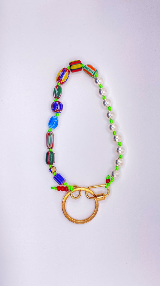 Millefiori bead keychain on green cord
