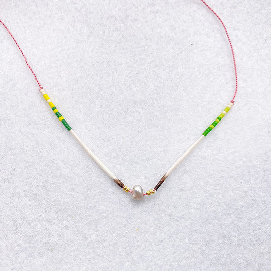 Pearl quill necklace on pink cord